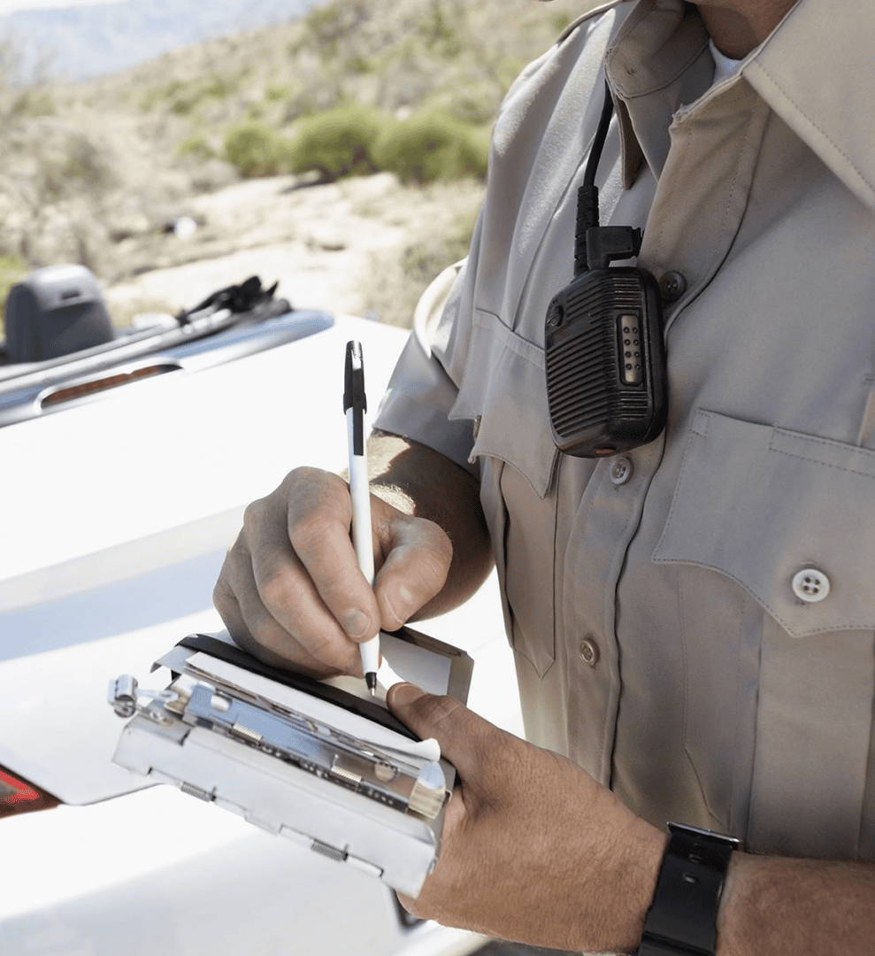 Law enforcement officer with a radio