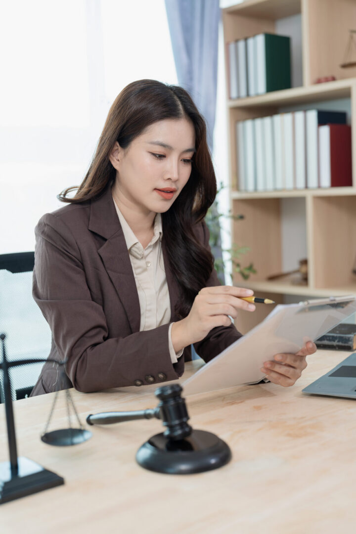 Professional woman reading paperwork