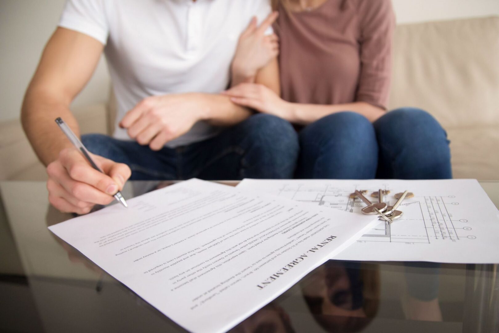 Signing home purchase agreement