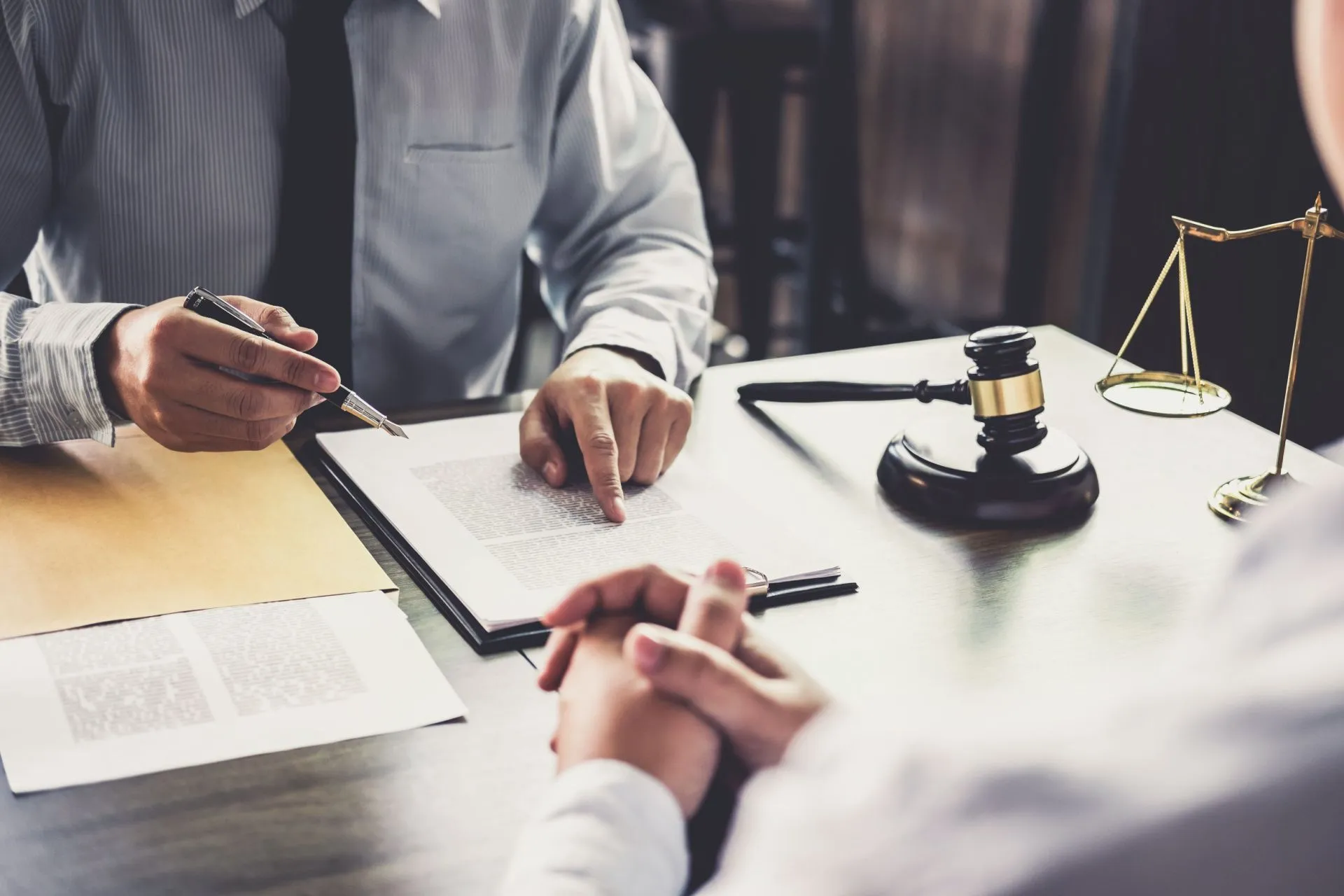 Legal consultation with documents and gavel